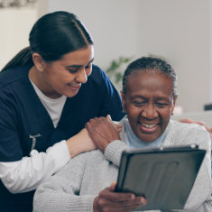 Tablet, discussion and nurse with patient for research on medical diagnosis in nursing home